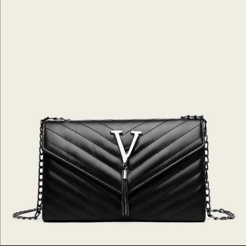 V black handbag